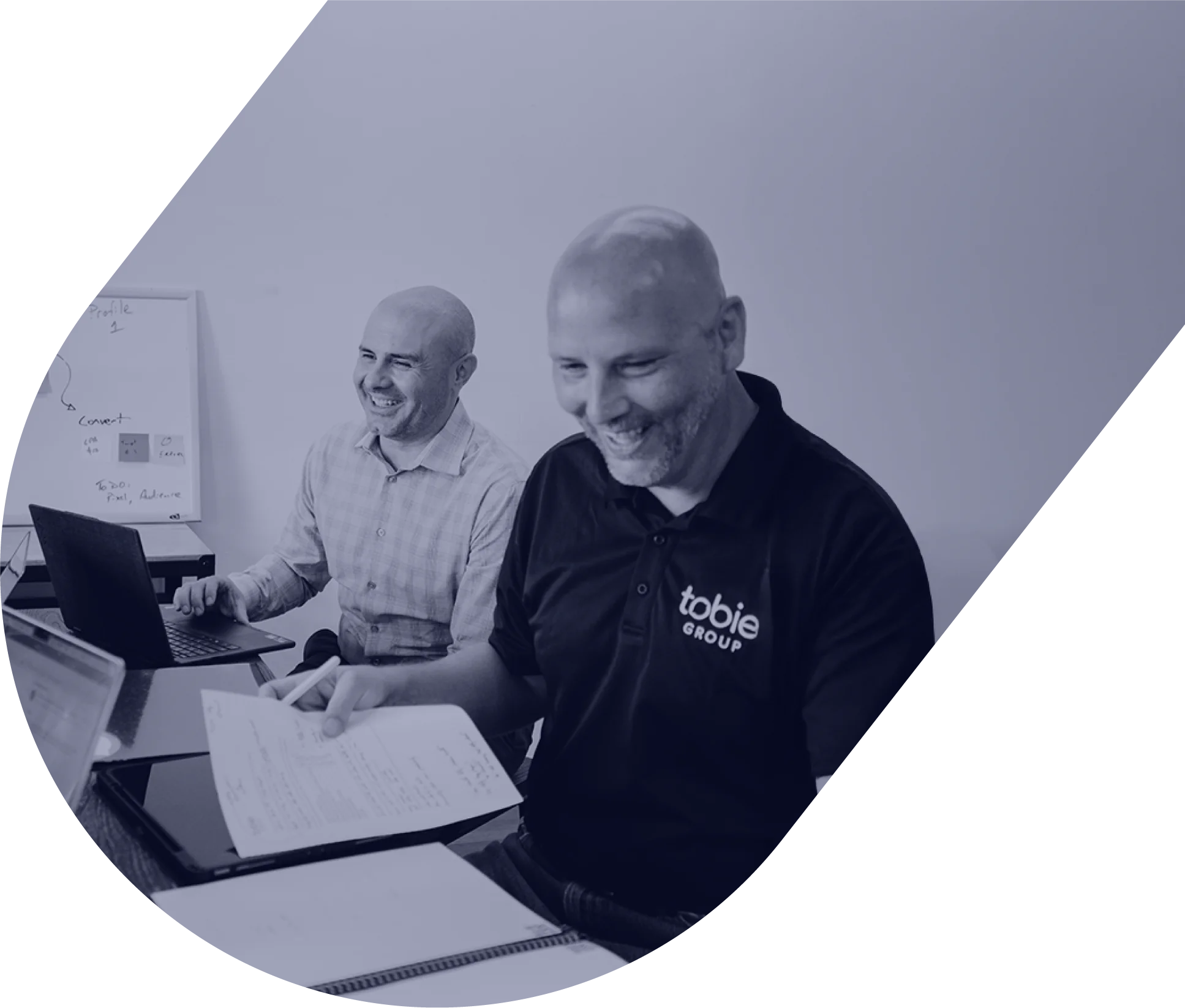 Tobie Group team reviewing marketing performance charts
